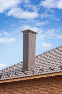 prefabricated chimney on metal roof