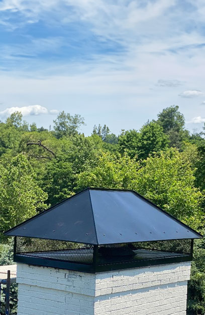 Black metal chimney cap